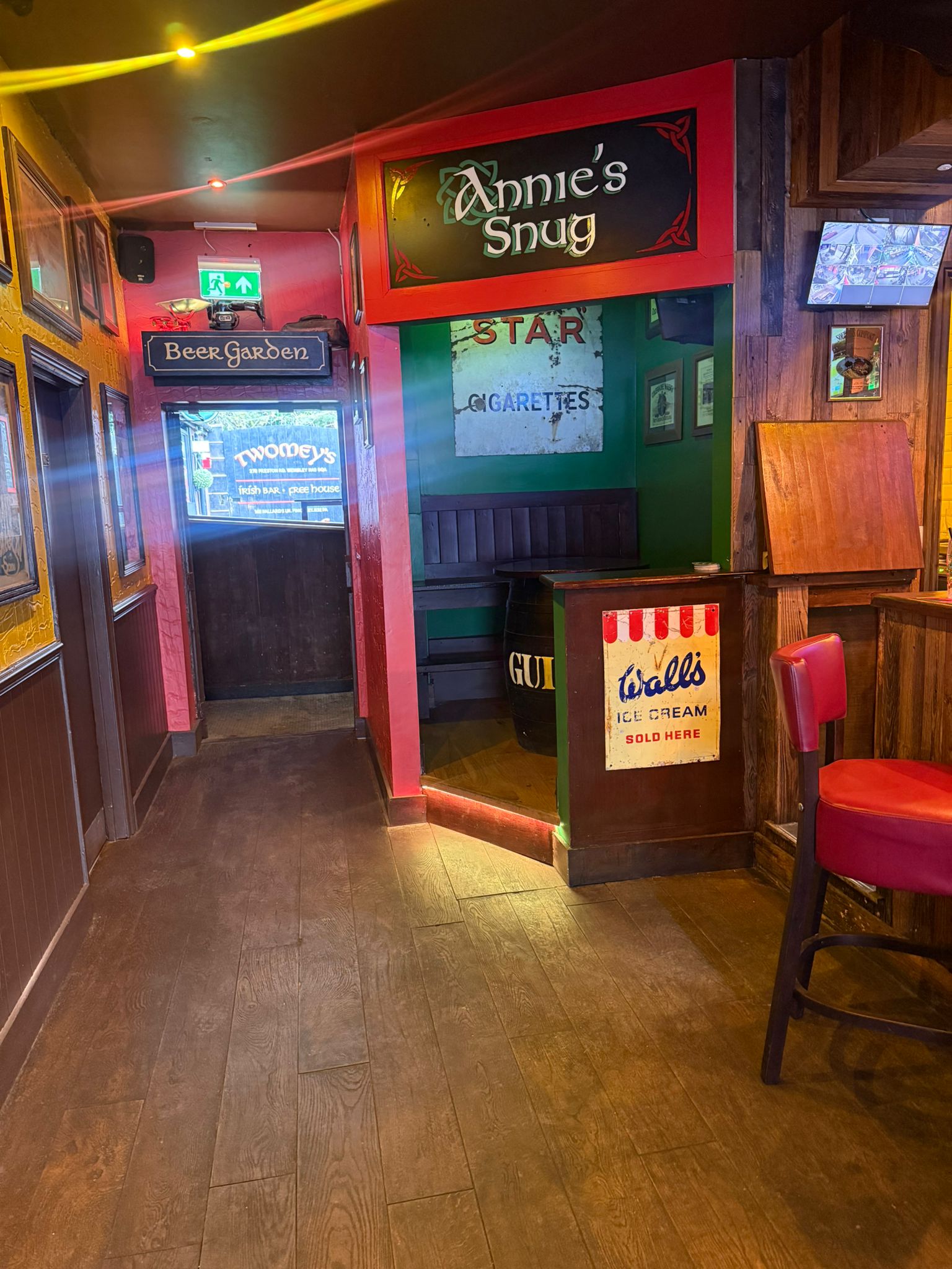 Annie's Snug and beer garden corridor