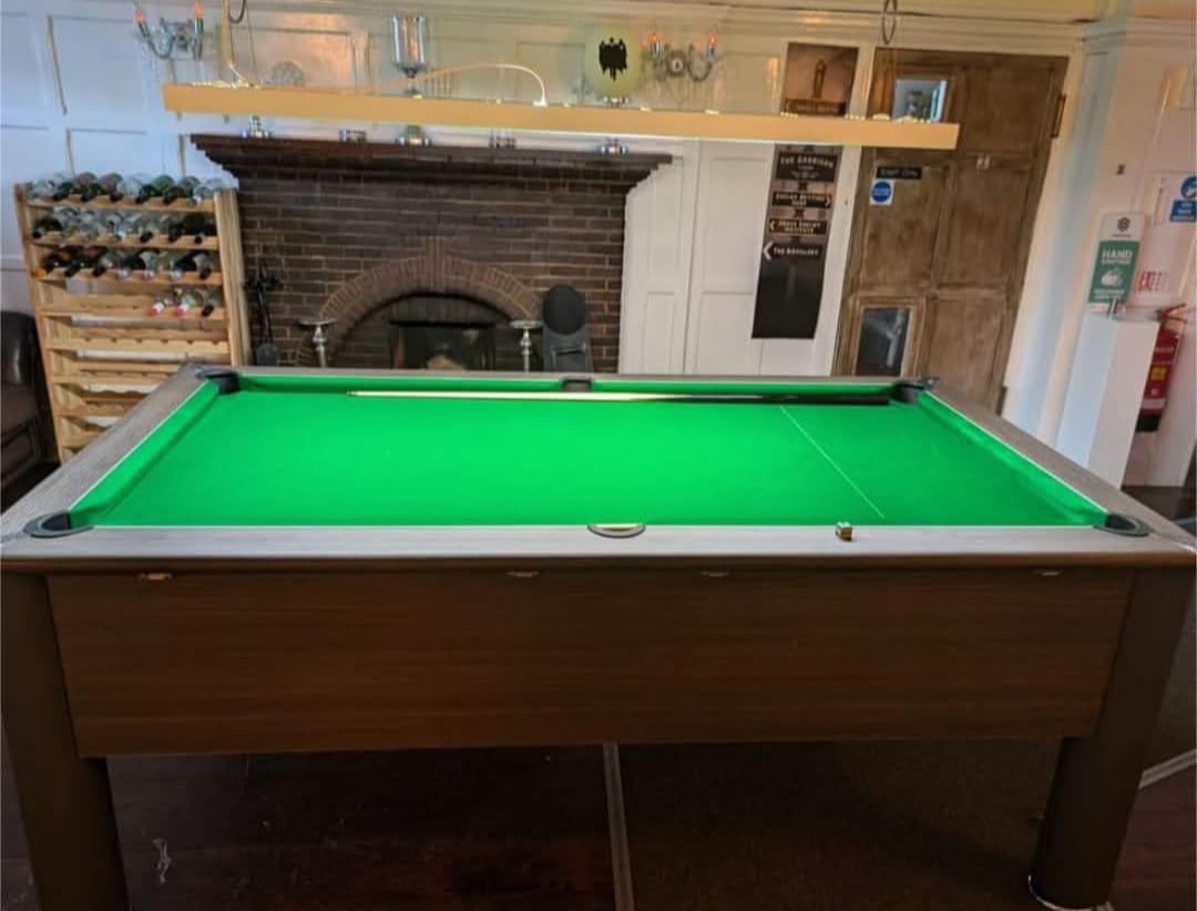 Pool table and fireplace